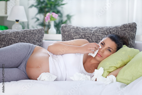 Photo: Upset pregnant woman crying Upset pregnant woman crying