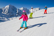 Skiing, winter, ski lesson - skiers on mountainside