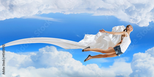 Photo: Modern style dancer against blue sky Modern style dancer against blue sky