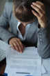 Closeup on thoughtful business woman working with documents