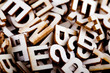 Jumbled wooden letters close up