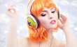 Woman dancing and listening to music with headphones
