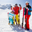 Skiing, winter fun - happy family ski team