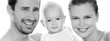 Happy young family with baby