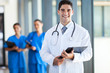 young medical doctor and staff in hospital