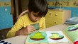 Video: Young little boy painting on the paper Young little boy painting on the paper