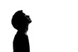 one young teenager boy or girl looking up silhouette