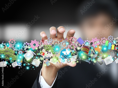 Photo: Businessman holding object Businessman holding object
