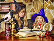 Witch  children with crystal ball.