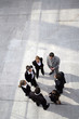 Photo: Business team stood in a circle Business team stood in a circle