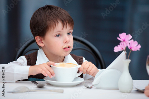 Photo: Mother and son having lunch together Mother and son having lunch together