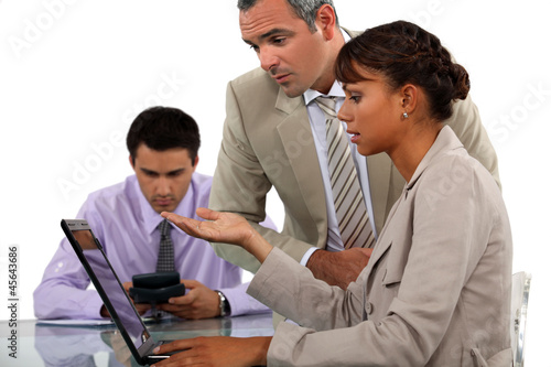 Photo: Office workers with a laptop Office workers with a laptop