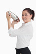Woman shaking cocktail
