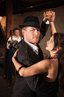 Photo: Handsome Tango Dancer with Partner Handsome Tango Dancer with Partner