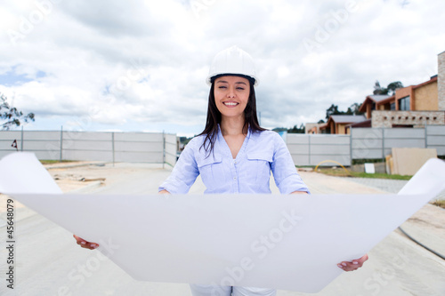 Photo: Civil engineer looking at blueprints Civil engineer looking at blueprints