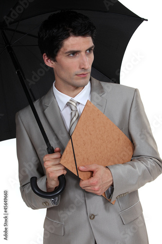 Photo: Businessman with an umbrella Businessman with an umbrella