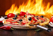 Hot pizza with oven fire on background Hot pizza with oven fire on background