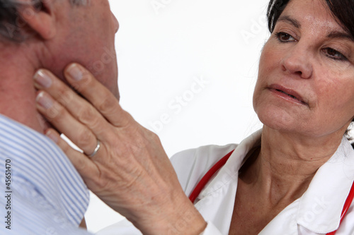 Photo: Doctor examining her patient Doctor examining her patient