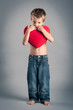 Little boy playing with red heart. Valentines Day concept.