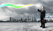 Photo: Businessman with colourful light beam in his hands Businessman with colourful light beam in his hands