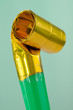 Foto: Party Blowout (Noise Maker) On Green Background Party Blowout (Noise Maker) On Green Background