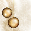 Vector: Two golden baubles on bright beige background Two golden baubles on bright beige background