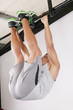 The sportsman the guy, carries out difficult exercise, sports gy