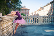 Young beautiful ballerina dancing in Bologna - Pincio, Italy. 