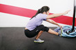 Young Woman Exercising on gym