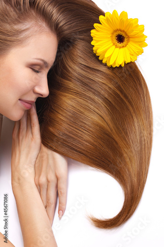 Photo: young woman with long shining hair sleep young woman with long shining hair sleep