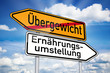 Foto: Wegweiser mit Übergewicht und Ernährungsumstellung Wegweiser mit Übergewicht und Ernährungsumstellung