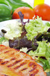 combo platter with chicken and green salad