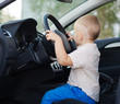 Little boy pretending to drive