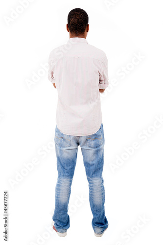Photo: Young man from back, isolated on white Young man from back, isolated on white