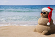 Snowman made out of sand. Holiday concept can be used for New Ye