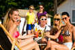 People at beach drinking having a party