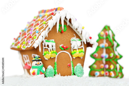 Photo: Gingerbread house isolated Gingerbread house isolated