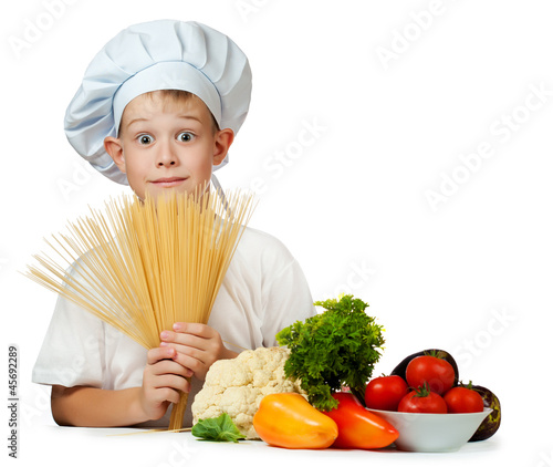 Photo: cook is holding raw spaghetti. isolated cook is holding raw spaghetti. isolated