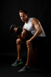 Male dumbbelll lifting