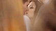 Wonderful young bride looking intently love into her husband