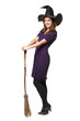 The  young beautiful witch with a broom and hat