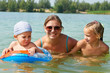 Photo: Portrait of happy mother, daughter and son Portrait of happy mother, daughter and son