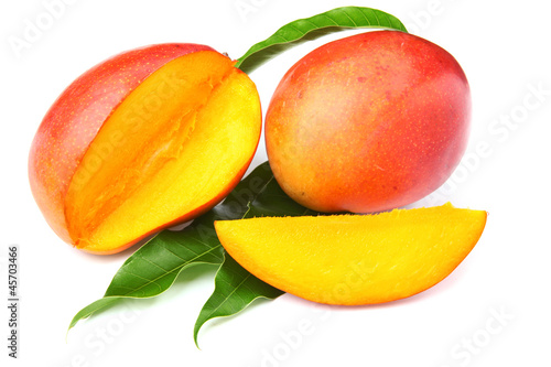 Photo: fresh mango fruit with cut and real mango leafs fresh mango fruit with cut and real mango leafs