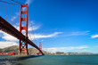 Golden Gate bridge with the cargo boat