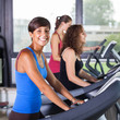 People Running on Treadmill in the Gym