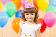 joyful kid girl on birthday party