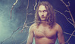 Portrait of long haired man with spooky eyes