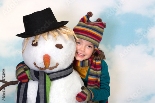 Photo: Loving the snowman Loving the snowman