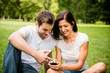 Young couple with smartphone