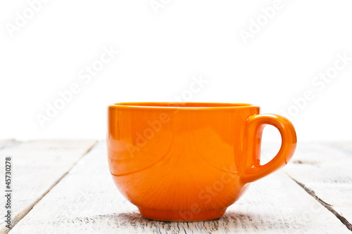 Photo: Orange coffee cup Orange coffee cup